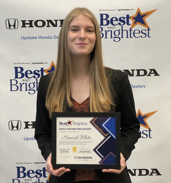 Sandy Creek senior Hannah White accepts her 2023 Best and Brightest Award.   